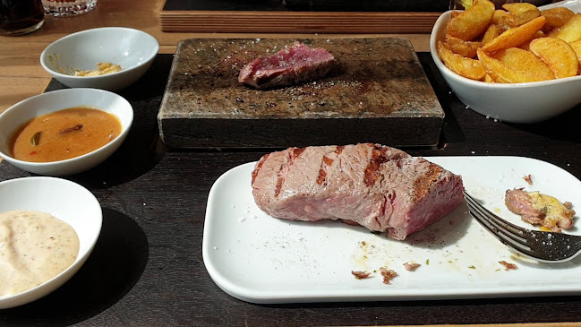 Opinii despre Steakhouse Hot Stone Niederuzwil în Niederuzwil - Gastronomie und Hotellerie