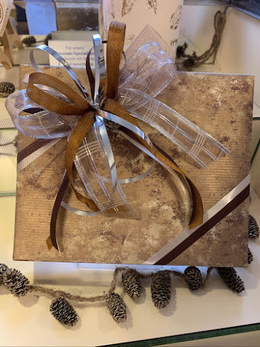 Opinii despre COQ AU VIN Chocolatière und Weinhandel în Grenchen - Gastronomie und Hotellerie