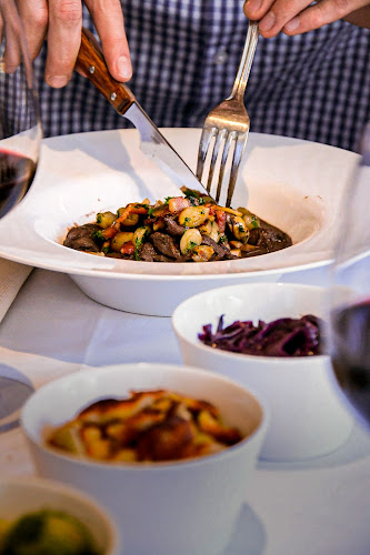 Au Pied de Cochon - Gastronomie und Hotellerie