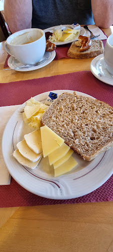 Opinii despre Bäckerei Konditorei Tea-Room Zingg în Uettligen - Gastronomie und Hotellerie