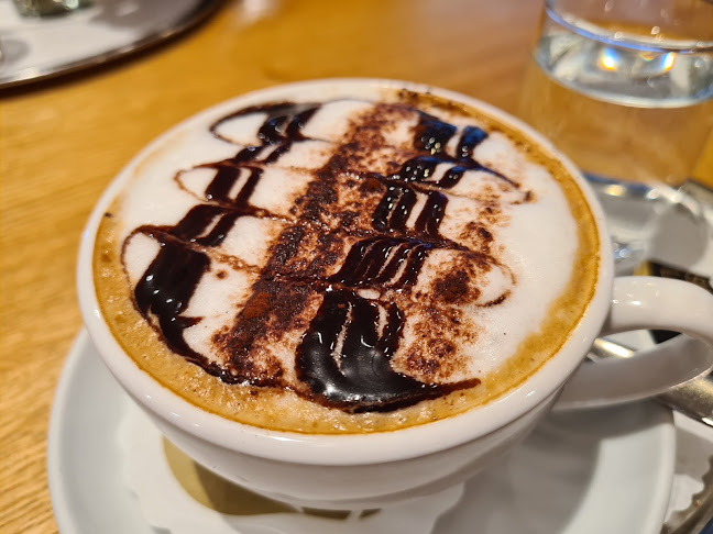 Opinii despre Chocolaterie am Klosterplatz în St. Gallen - Gastronomie und Hotellerie