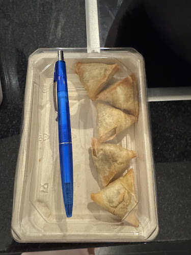 YUSHU- Sushi, Momo's & more