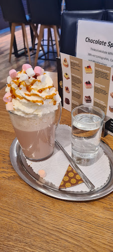 Opinii despre Chocolaterie am Klosterplatz în St. Gallen - Gastronomie und Hotellerie