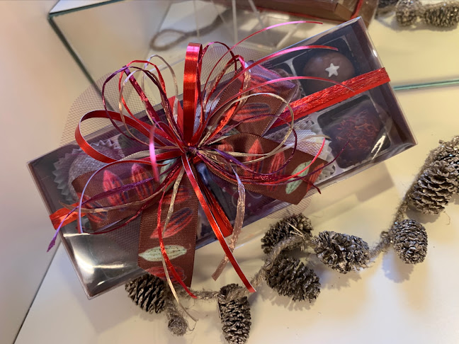 COQ AU VIN Chocolatière und Weinhandel - Grenchen